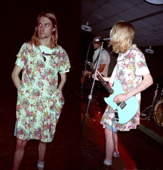 kurt cobain in a floral dress playing guitar and singing