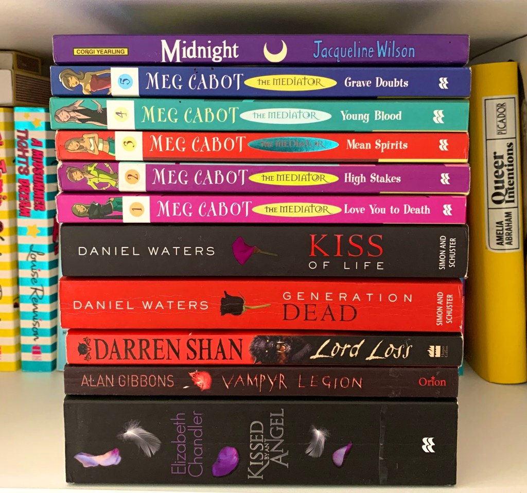 supernatural books in a pile YA